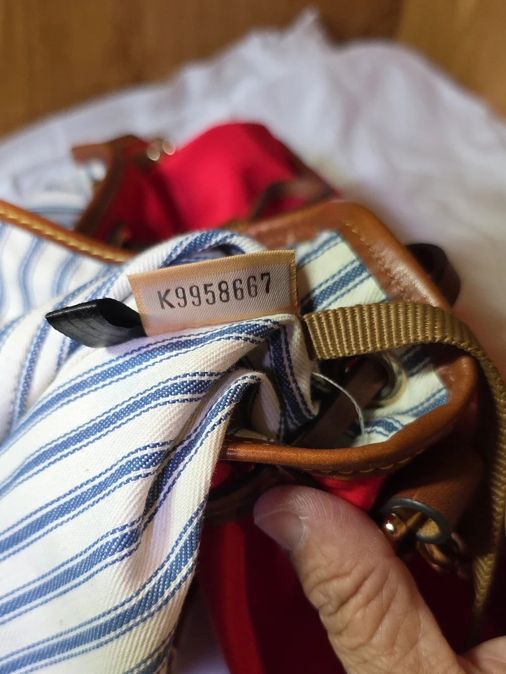 Dooney & Bourke Red Drawstring Bucket Bag with Brown Trim